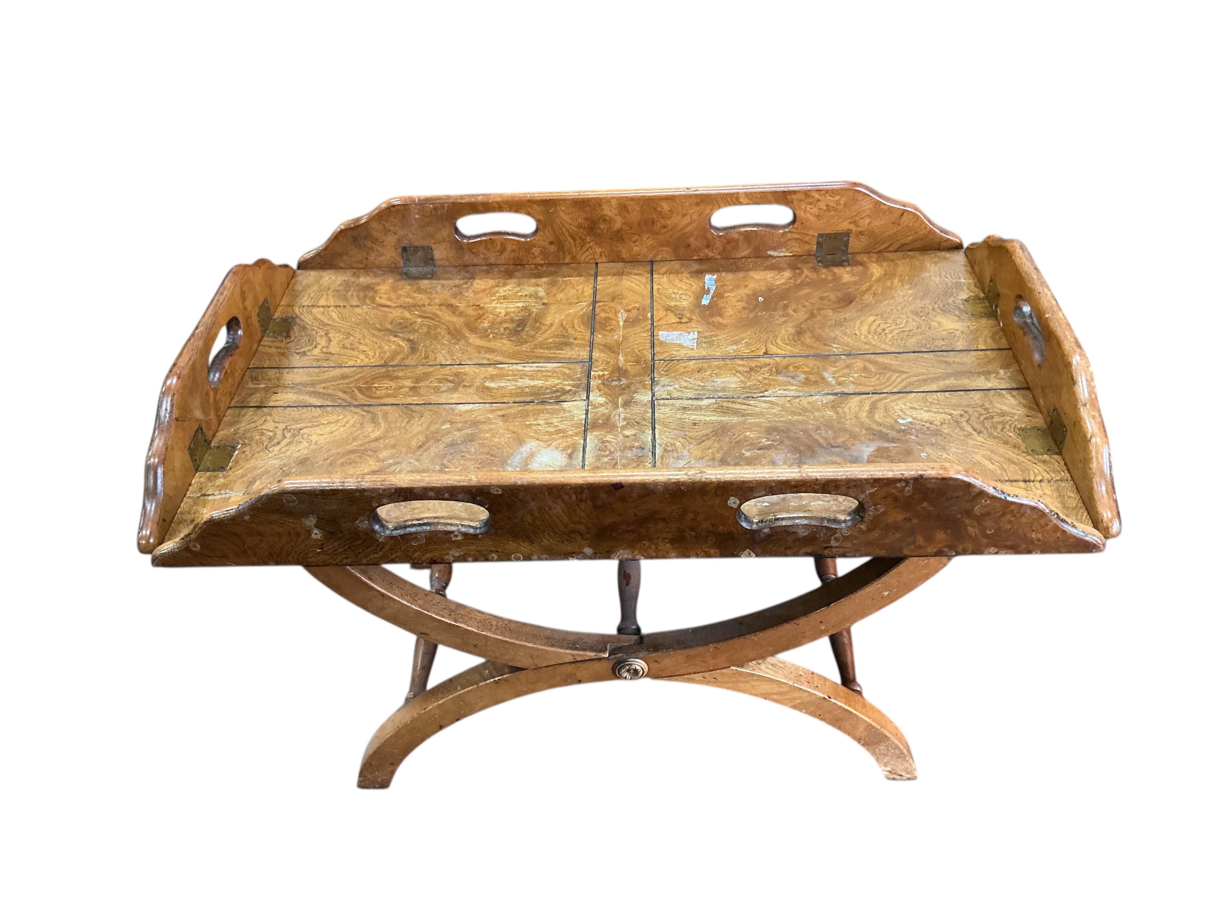 A reproduction burr oak folding butler’s tray on stand, width 84cm, depth 54cm, height 58cm